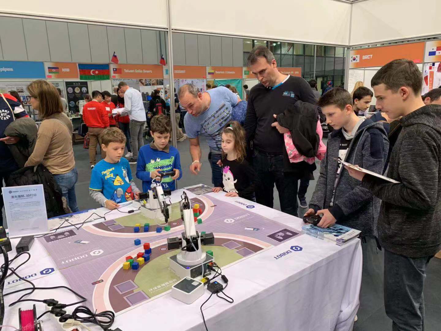 students interact with the DOBOT magician